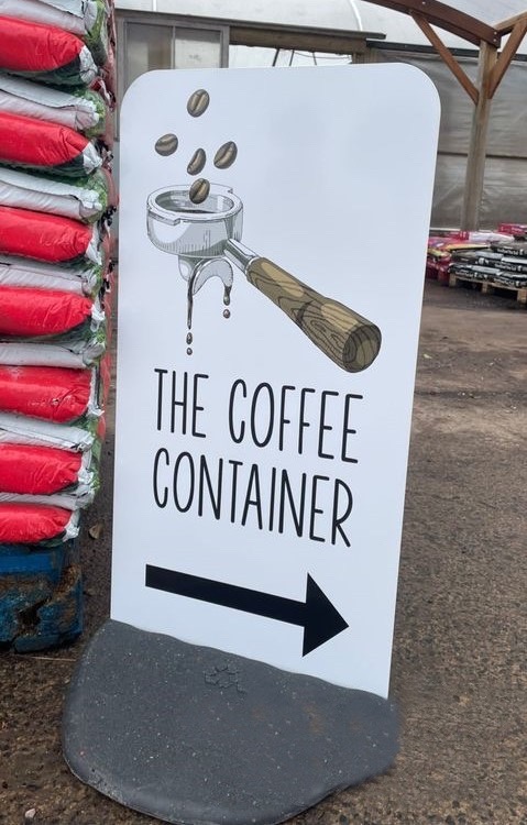 The Coffee Container Pavement Sign.